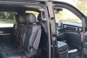 Athen lufthavn fra/til Athen sentrum Unik transport med varebil