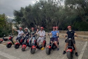Ateny: Zwiedzanie miasta z przewodnikiem skuterem elektrycznym lub rowerem elektrycznym