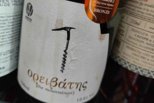 Esperienza di olio extravergine di oliva con vino ed erbe aromatiche