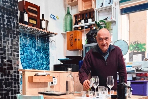 Esperienza di olio extravergine di oliva con vino ed erbe aromatiche