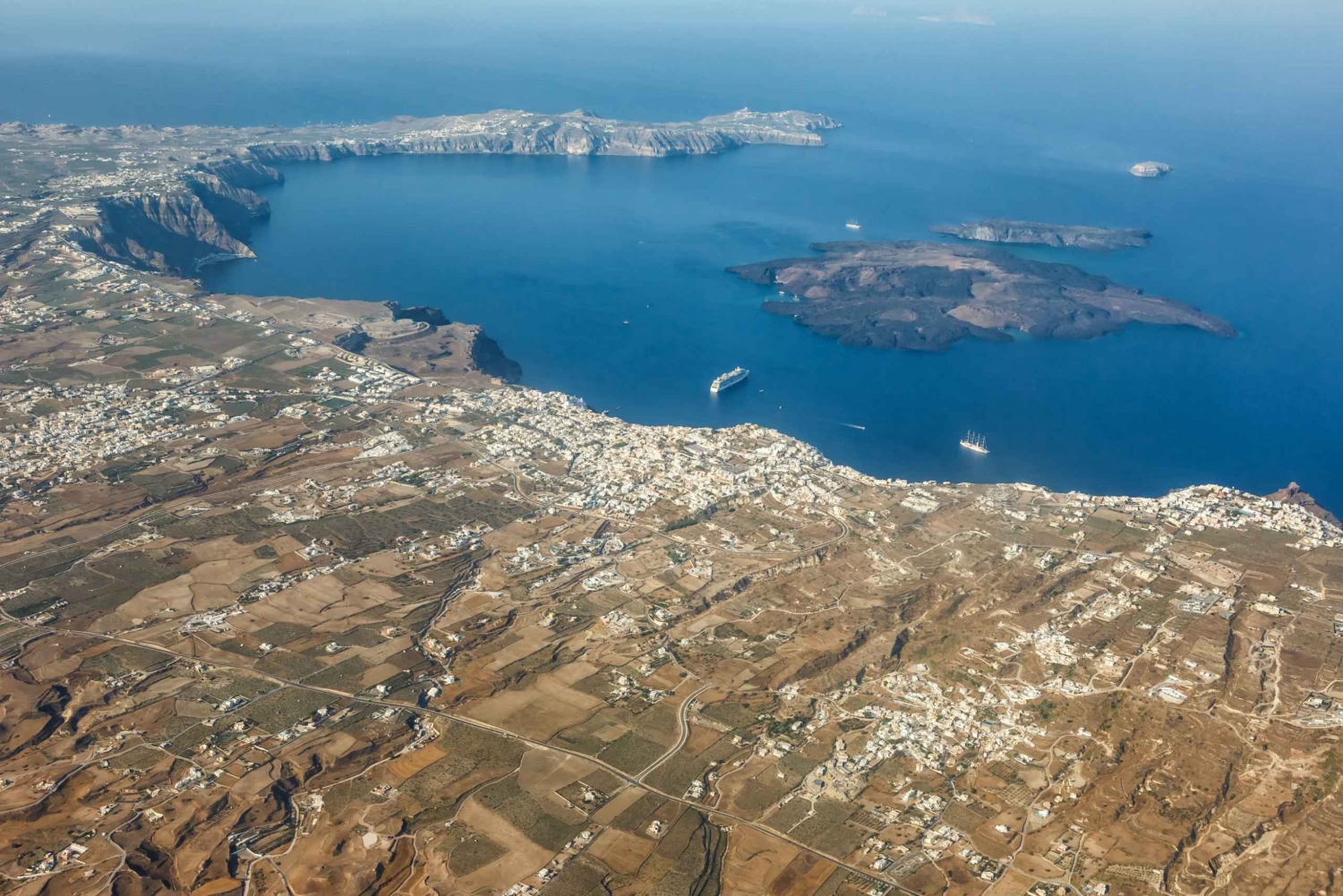 From Santorini: Private One-Way Helicopter Flight to Islands