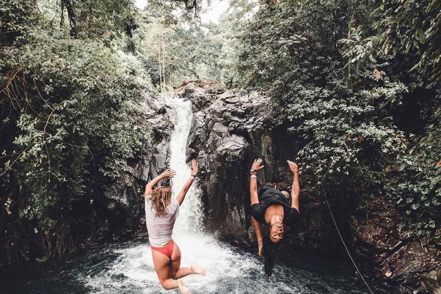 Jumping Sliding at Aling- Aling Waterfall and Handara Gate
