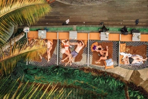 Ubud: Jungle Club, Waterfall, Market, and Tanah Lot Tour