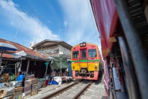 Bangkokissa: Maeklongin rautatietori ja Amphawan kelluvat markkinat.