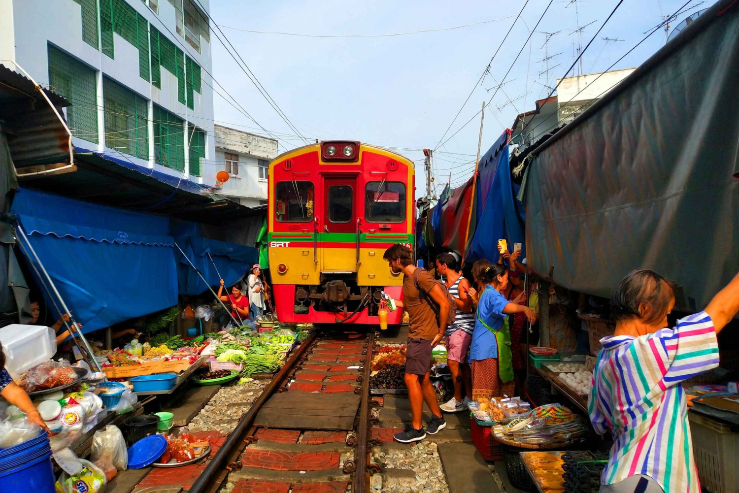 Bangkok Maeklong Railway Market & Damnoensaduak Markets Tour