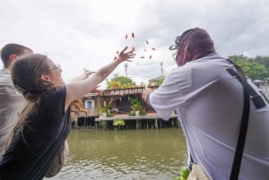 Banguecoque escondida: canal local e vila de artistas de barco elétrico