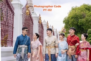 Thai Costume Photographer at Wat Arun in Bangkok, Thailand