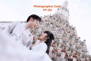 Thai Costume Photographer at Wat Arun in Bangkok, Thailand