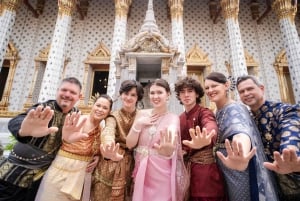 Thai Costume Photographer at Wat Arun in Bangkok, Thailand