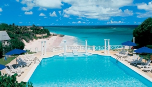 Major Michael Hartland showing HRH Prince Edward, Earl of Wessex, Cromwell's Republican Arms on a gun of 1652 with Colonel A.E. Quintyne, Chief of Staff of the Barbados Defence Force