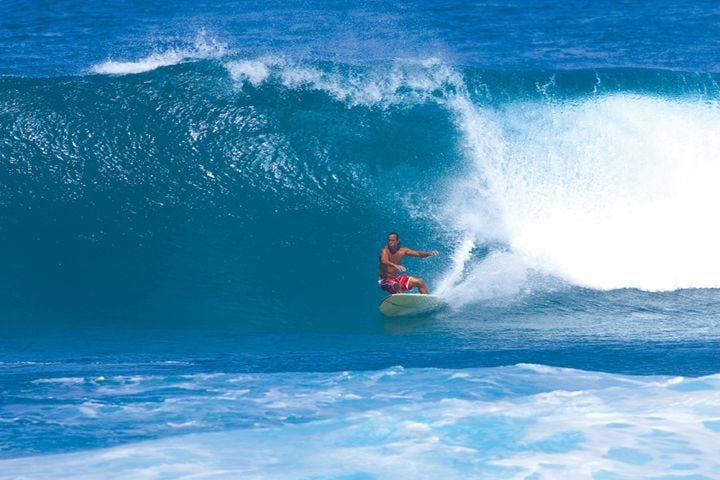 Surfing in Bathsheba (Credit: Chris Welch for Brian Talma)