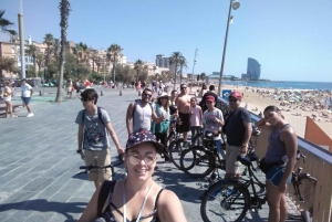 Barcelona: Guided Bike Tour with Local Tapas and Wine