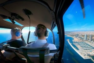 Barcellona: volo in elicottero con crociera in yacht opzionale