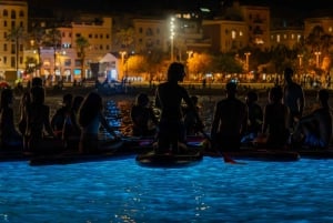 Starlight Paddlesurfing om natten i Barcelona