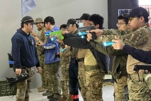 Pequim: Batalha de pistolas de água em recinto fechado com jogadores locais