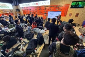 Pequim: Batalha de pistolas de água em recinto fechado com jogadores locais