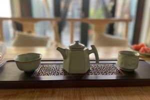 Kinesisk teceremoni i Beijings Hutong-gårdhave