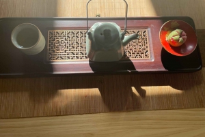 Chinese Tea ceremony in Beijing Hutong courtyard
