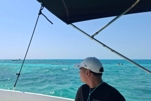 From Your Hotel in San Ignacio to Caye Caulker/Van + Ferry