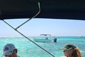 From Your Hotel in San Ignacio to Caye Caulker/Van + Ferry