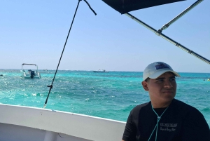 From Your Hotel in San Ignacio to Caye Caulker/Van + Ferry