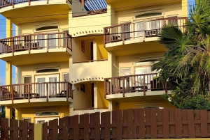 From Your Hotel in San Ignacio to Caye Caulker/Van + Ferry