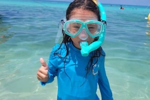 Snorkel with rays, sharks and turtles at a tropical isle