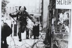 East German Soldier escapes over Berlin Wall