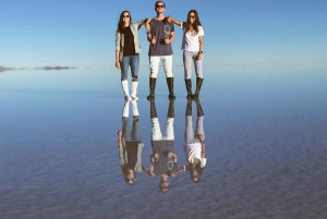 Seasonal tour: Sunrise with reflections in the water, Salar