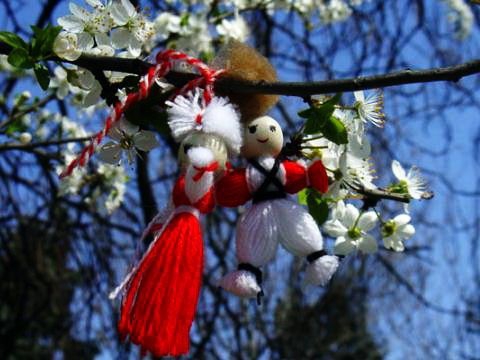 Tie your martenitsa on a blossoming tree