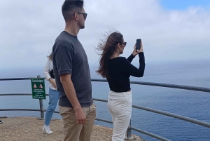 Cape Peninsula sunset tour alongside of mountain and ocean