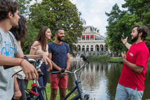 Hidden Amsterdam by bike: Stories & Local Stops
