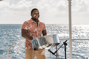 rondvaart tijdens zonsondergang met live steelpan-muziek en diner
