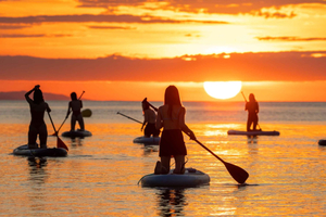 Barcelona: Solopgang på paddleboard med instruktør og fotos