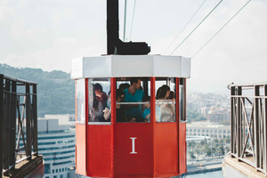 Panoramic Barcelona: Montjuïc, Cable Car, and Beach