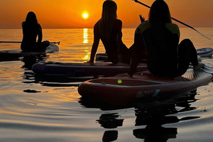 Rent a Stand-Up Paddleboard at Sunrise in Barcelona