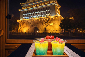 Pékin : visite de nuit de Qianmen avec bus touristique et cocktails