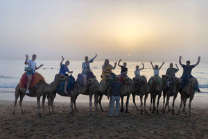 Caves, sunset, camel ride with beach view & barbecue dinner
