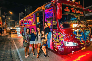 CARTAGENA: Classic party bus with an entertainer and free disco entry!