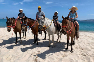 Horseback riding on the beach