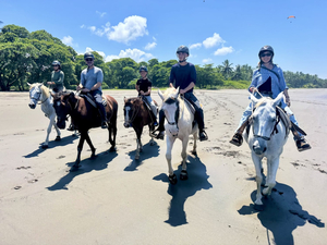 Horseback Riding on the Beach - by CR Beach Barn