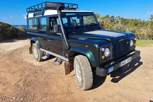 Troodos Mountains: a day trip with a green 4×4 Land Rover to villages and a monastery.