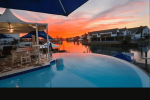 Port Elizabeth: St Francis Bay Private Escape & Canal Cruise