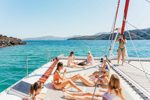 Santorini: Catamaran Tour with BBQ Dinner, Drinks, and Music