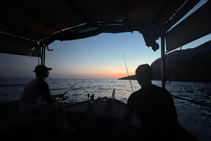 Sfakia: Vissen op barracuda bij zonsondergang met een professionele visser