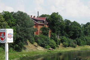 Kayak at the Latvian-Lithuanian border, Lithuanian village.
