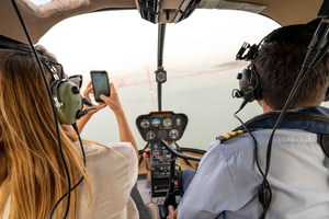 Guided Bike Tour, Helicopter Flight, and Boat Trip
