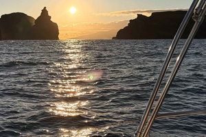 Sunset Boat Tour with Snorkeling and Drinks