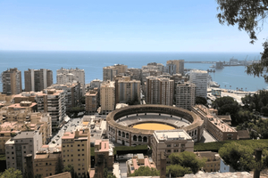 Torremolinos: Malaga Walking Tour with Hotel Pickup + Gift