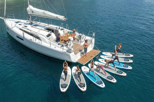 Playa de Palma - Sunrise Yoga on a Sailboat with Paddle Surfing and Brunch